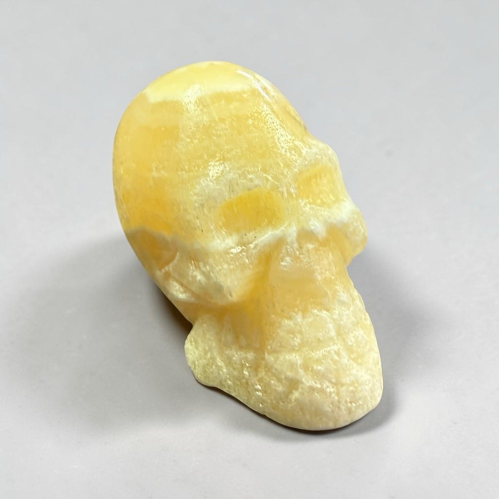 Carved Yellow Skull Honey Calcite Crystal Carving Stone Figurine 2 1/4"T
